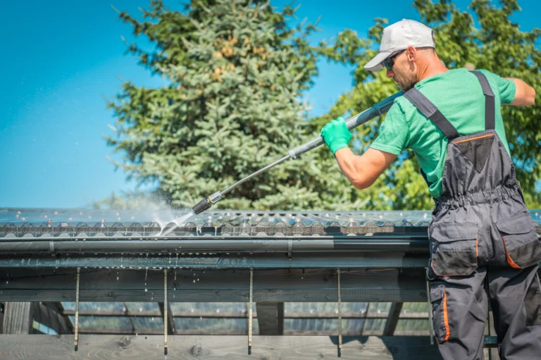 Gutter contractor discussing an installation estimate with a homeowner